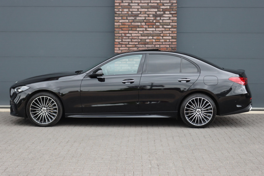 Mercedes-Benz C-Klasse 300 e 4MATIC AMG Line | Distronic+ | Massage | Burmester | Panoramadak | Memory | Digital Light | HUD | Surround Camera | Augmented Reality | Verwarmd Stuurwiel |