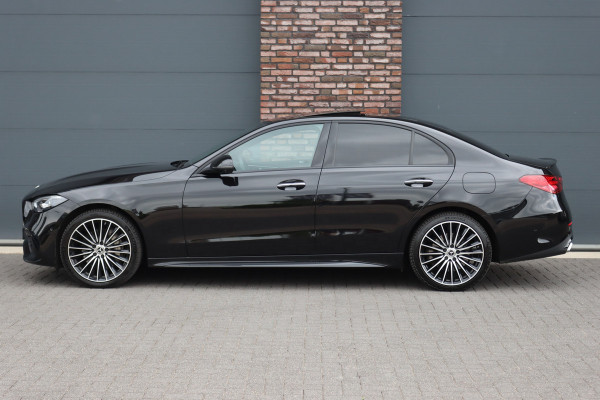 Mercedes-Benz C-Klasse 300 e 4MATIC AMG Line | Distronic+ | Massage | Burmester | Panoramadak | Memory | Digital Light | HUD | Surround Camera | Augmented Reality | Verwarmd Stuurwiel |