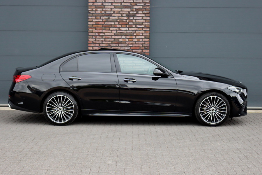 Mercedes-Benz C-Klasse 300 e 4MATIC AMG Line | Distronic+ | Massage | Burmester | Panoramadak | Memory | Digital Light | HUD | Surround Camera | Augmented Reality | Verwarmd Stuurwiel |