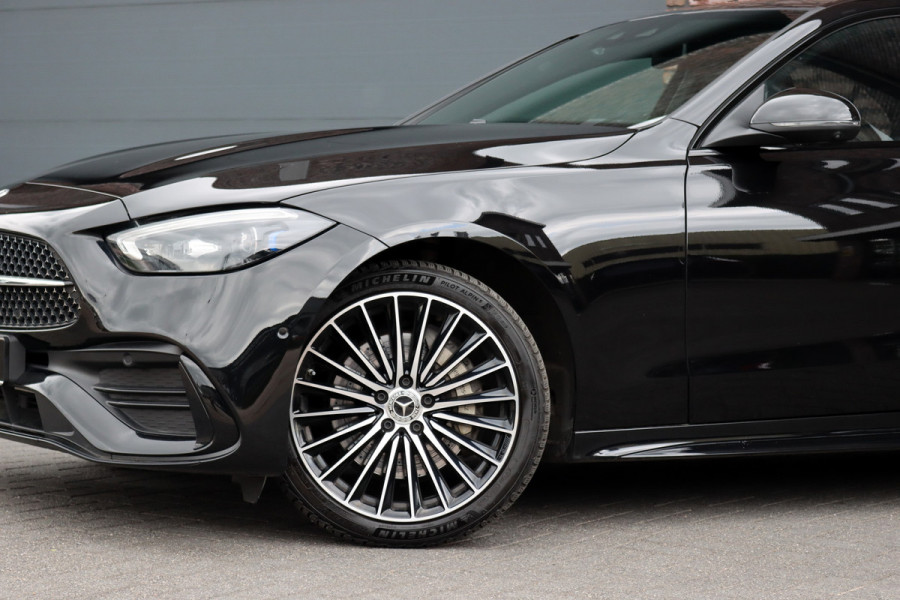 Mercedes-Benz C-Klasse 300 e 4MATIC AMG Line | Distronic+ | Massage | Burmester | Panoramadak | Memory | Digital Light | HUD | Surround Camera | Augmented Reality | Verwarmd Stuurwiel |