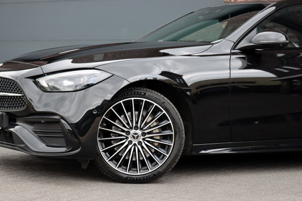 Mercedes-Benz C-Klasse 300 e 4MATIC AMG Line | Distronic+ | Massage | Burmester | Panoramadak | Memory | Digital Light | HUD | Surround Camera | Augmented Reality | Verwarmd Stuurwiel |