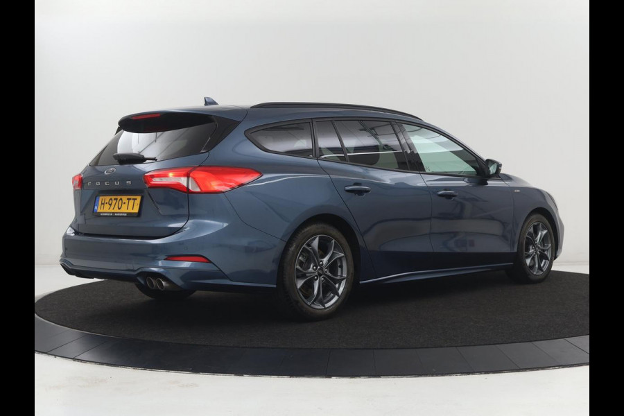 Ford Focus 1.5 EcoBoost ST Line | Trekhaak | Stoel & Stuurverwarming | Keyless | Carplay | Climate control | Parkeerhulp | Full LED | Cruise control | Navigatie | Bluetooth | Getint glas