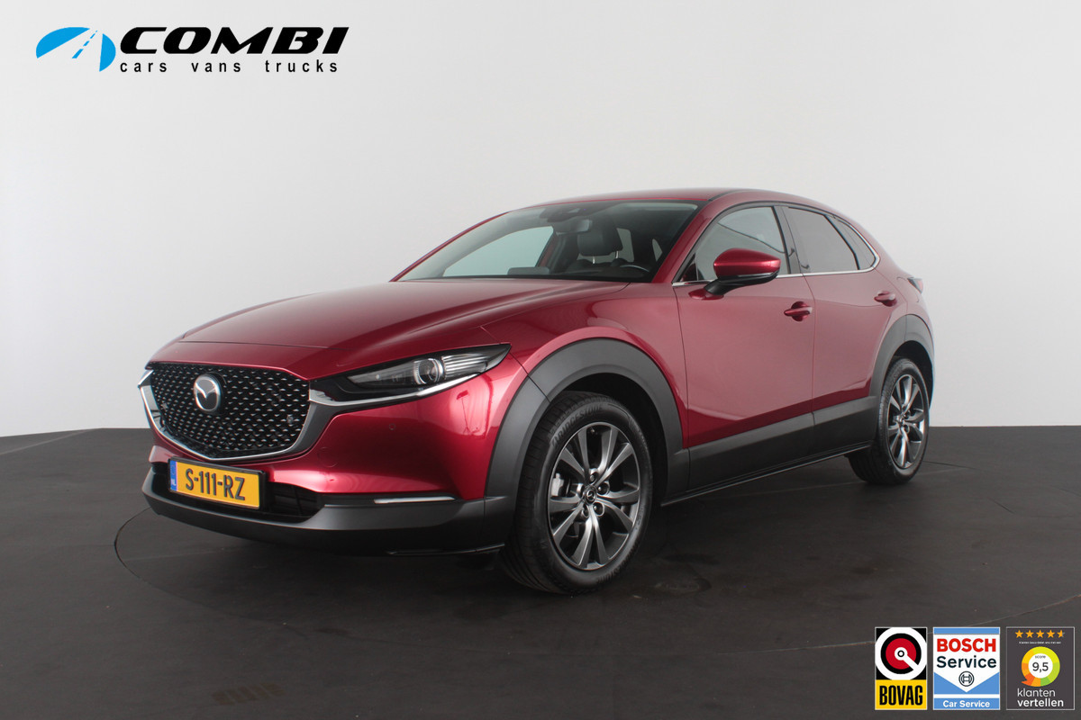 Mazda CX-30 2.0 e-SkyActiv-X M Hybrid Luxury > 186pk/Trekhaak/Crystal Red Soul/Bose/Leer/Memory...