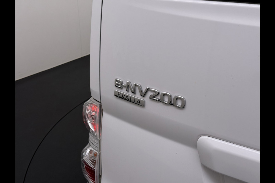 Nissan e-NV200 Evalia 7-Persoons SOH 93% 40kWh Camera Navi Stoel+Stuurverwarming Cruise Control Ecc Connect Edition Schuifdeuren Privacy Glas Lmv Regen+Lichtsensor Isofix Keyless 1e Eigenaar Origineel Nederlandse Bus