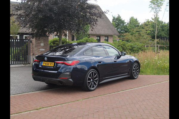 BMW 4 Serie Gran Coupé 420i Business Edition Plus | M-Pakket | Panoramadak | Camera | Sfeerverlichting | Leer |