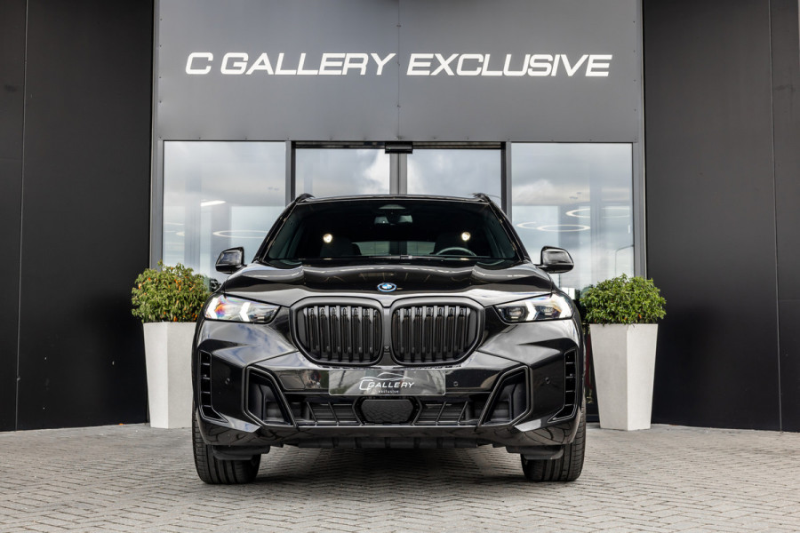 BMW X5 xDrive50e - M Sport Pro | Skylounge | B&W | Kuipstoelen | Luchtvering