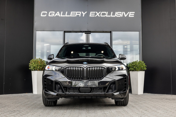 BMW X5 xDrive50e - M Sport Pro | Skylounge | B&W | Kuipstoelen | Luchtvering