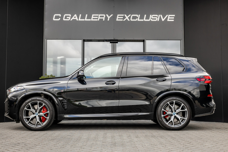 BMW X5 xDrive50e - M Sport Pro | Skylounge | B&W | Kuipstoelen | Luchtvering