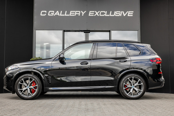 BMW X5 xDrive50e - M Sport Pro | Skylounge | B&W | Kuipstoelen | Luchtvering