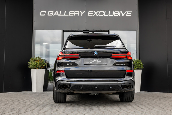 BMW X5 xDrive50e - M Sport Pro | Skylounge | B&W | Kuipstoelen | Luchtvering