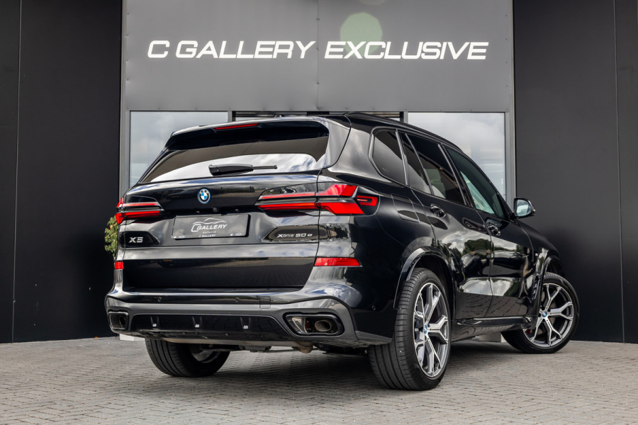 BMW X5 xDrive50e - M Sport Pro | Skylounge | B&W | Kuipstoelen | Luchtvering