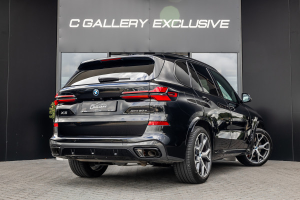 BMW X5 xDrive50e - M Sport Pro | Skylounge | B&W | Kuipstoelen | Luchtvering