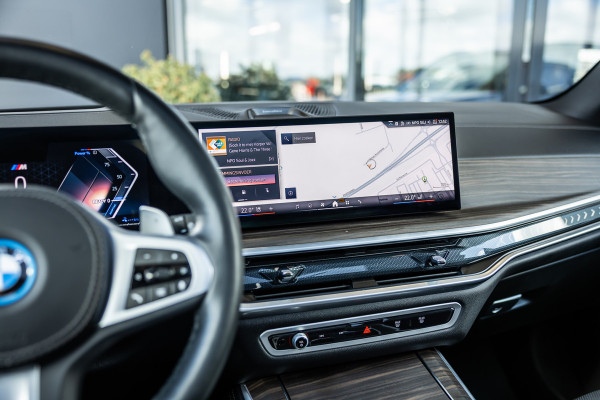 BMW X5 xDrive50e - M Sport Pro | Skylounge | B&W | Kuipstoelen | Luchtvering