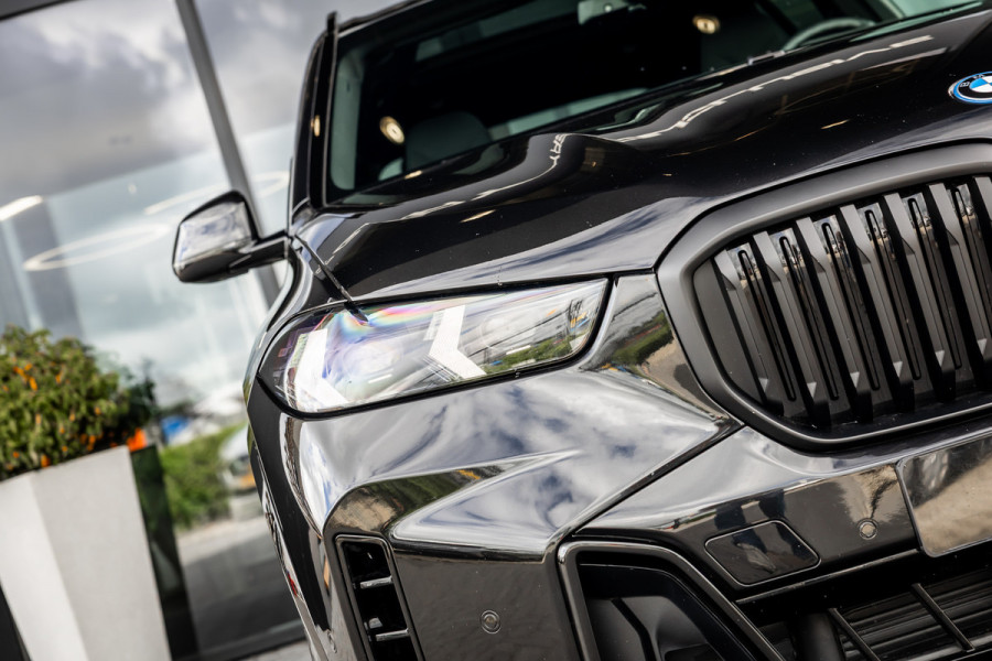 BMW X5 xDrive50e - M Sport Pro | Skylounge | B&W | Kuipstoelen | Luchtvering