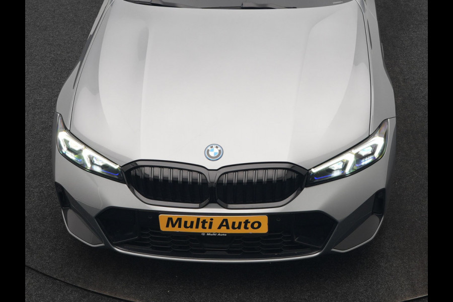 BMW 3 Serie Touring 330e xDrive M Sport PHEV FACELIFT MODEL 293pk Dealer O.H. | Trekhaak Af Fabriek | Adaptive Cruise | Lederen Sportstoelen Verwarmd | Sfeerverlichting | Apple Carplay | 19"L.M & M Sportremmen | Stuur Verwarmd | Hifi Audio | Adaptive LED | DAB | Plug In Hybrid |