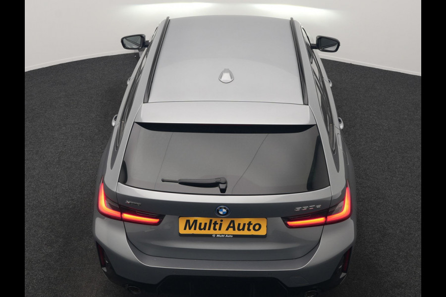 BMW 3 Serie Touring 330e xDrive M Sport PHEV FACELIFT MODEL 293pk Dealer O.H. | Trekhaak Af Fabriek | Adaptive Cruise | Lederen Sportstoelen Verwarmd | Sfeerverlichting | Apple Carplay | 19"L.M & M Sportremmen | Stuur Verwarmd | Hifi Audio | Adaptive LED | DAB | Plug In Hybrid |