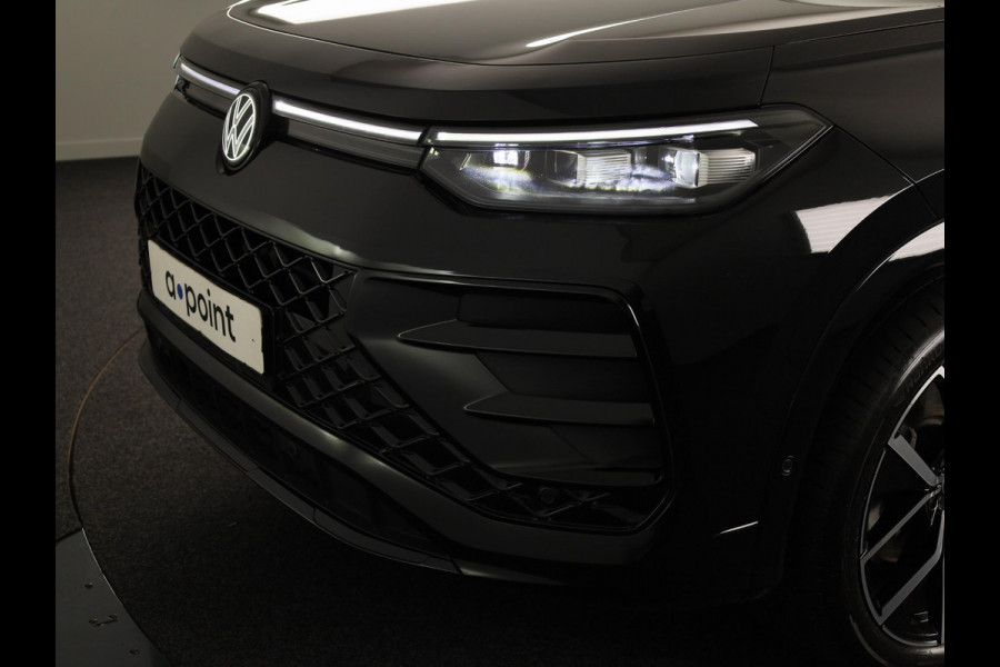 Volkswagen Tayron 1.5 eHybrid R-Line Edition 272 pk Automaat (DSG) | Verlengde garantie | Navigatie | Panoramadak | Trekhaak (wegklapbaar) | Parkeersensoren (Park assist) | Achteruitrijcamera | Black Style pakket | R-Line |