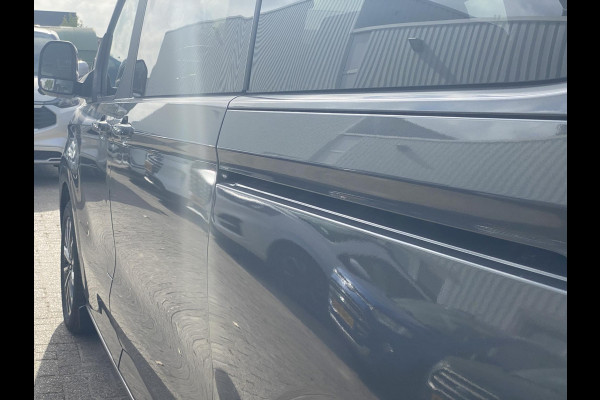 Ford Tourneo Custom 340 2.5 PHEV L2H1 Titanium X 233pk ZUID | 16-weg elek. AGR-stoel | Handsfree elek. dubbele zijschuifdeuren | Panoramadak | 15 B&O speaker | Inklapbare trekhaak | Verwarmbaar stuurwiel | Verwarmbare en elek. verstelbare stoelen tweede zitrij | Draadloos opladen | Prijs ex. BTW incl. BPM |  Prijs Incl. BTW en BPM 70.400