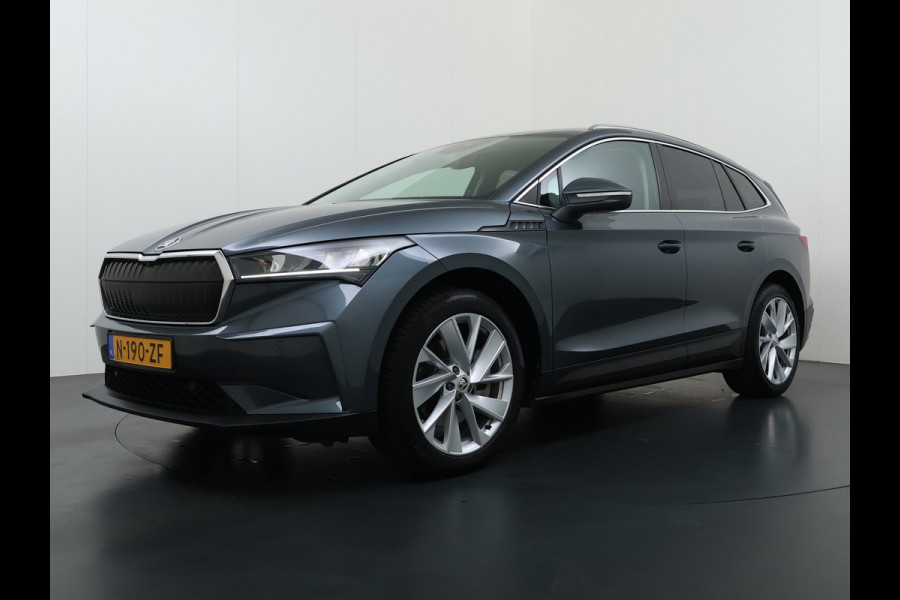 Škoda ENYAQ iV 80 Trekhaak SOH 95% Warmtepomp Adap.Cruise 3-Zone Ecc 360°Camera Stuur+Stoelverwarming Navi Ecc Pdc Draadloze telefoonlader Keyless Privacy Glas Lmv Led Apple Carplay Android Auto DAB P-Assist Dodehoek detectie File Asist 1.000KG Trekgewicht Origineel Nederlandse Auto