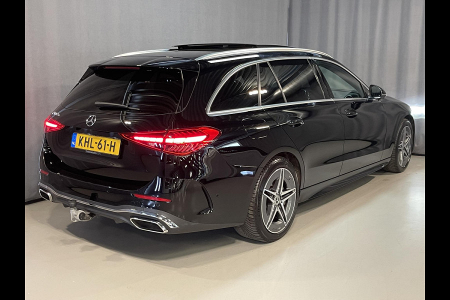 Mercedes-Benz C-Klasse Estate 300 e Star Edition AMG Line 18"/Panoramadak/Trekhaak/Stuur + stoelverwarming/Adaptieve cruise/Dodehoek/Sfeerverlichting premium/Elektrische klep/Apple Carplay & Android Auto