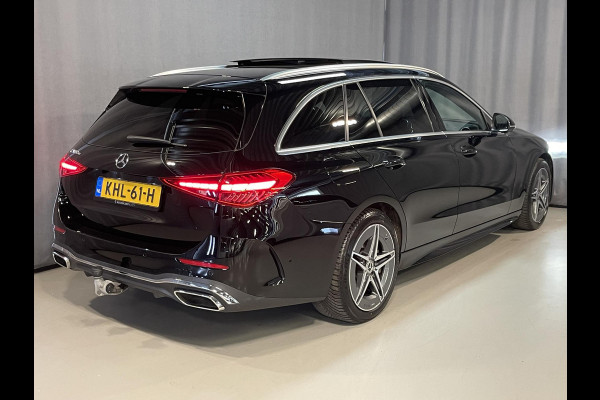 Mercedes-Benz C-Klasse Estate 300 e Star Edition AMG Line 18"/Panoramadak/Trekhaak/Stuur + stoelverwarming/Adaptieve cruise/Dodehoek/Sfeerverlichting premium/Elektrische klep/Apple Carplay & Android Auto