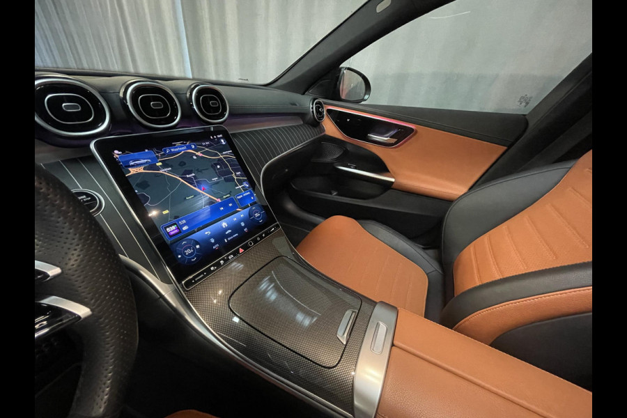 Mercedes-Benz C-Klasse Estate 300 e Star Edition AMG Line 18"/Panoramadak/Trekhaak/Stuur + stoelverwarming/Adaptieve cruise/Dodehoek/Sfeerverlichting premium/Elektrische klep/Apple Carplay & Android Auto