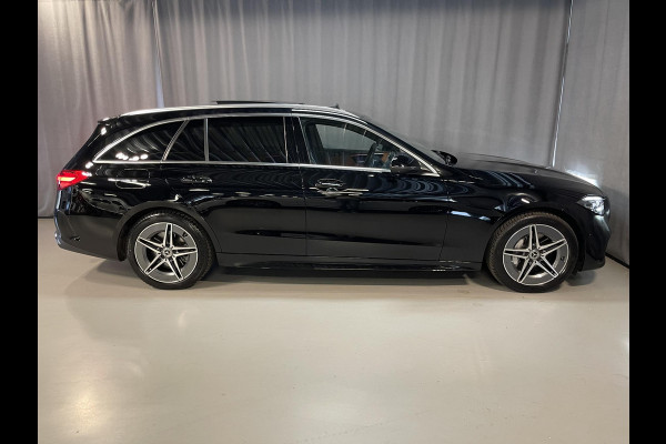 Mercedes-Benz C-Klasse Estate 300 e Star Edition AMG Line 18"/Panoramadak/Trekhaak/Stuur + stoelverwarming/Adaptieve cruise/Dodehoek/Sfeerverlichting premium/Elektrische klep/Apple Carplay & Android Auto