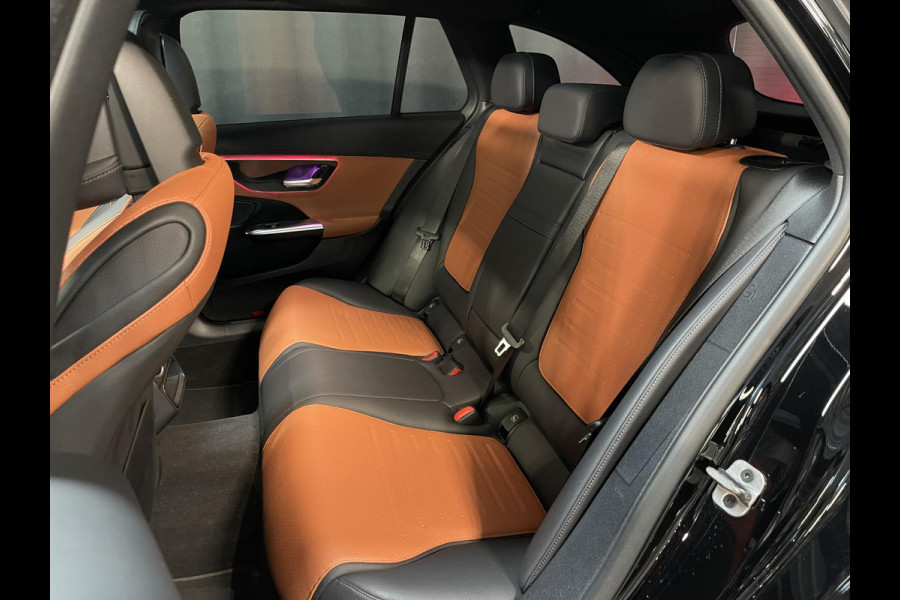Mercedes-Benz C-Klasse Estate 300 e Star Edition AMG Line 18"/Panoramadak/Trekhaak/Stuur + stoelverwarming/Adaptieve cruise/Dodehoek/Sfeerverlichting premium/Elektrische klep/Apple Carplay & Android Auto