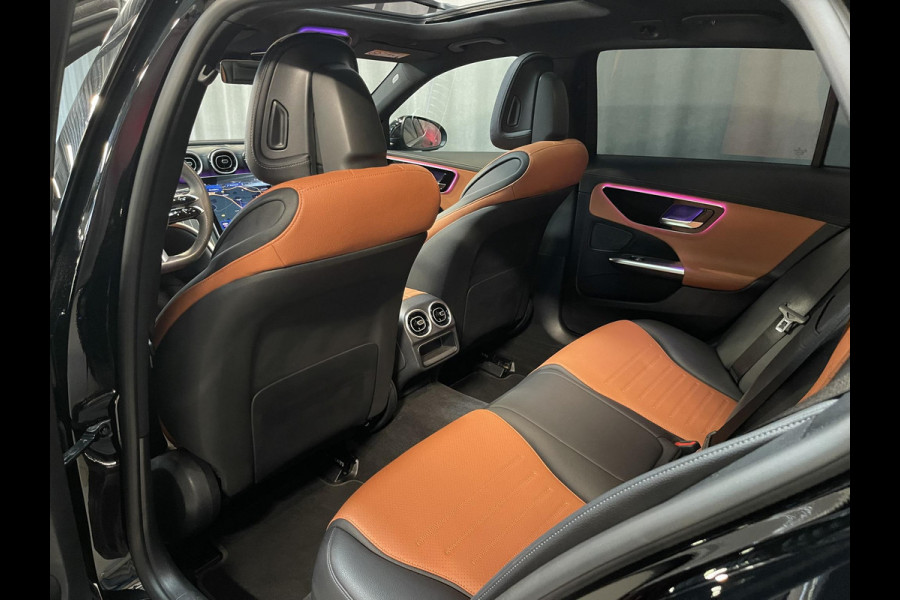 Mercedes-Benz C-Klasse Estate 300 e Star Edition AMG Line 18"/Panoramadak/Trekhaak/Stuur + stoelverwarming/Adaptieve cruise/Dodehoek/Sfeerverlichting premium/Elektrische klep/Apple Carplay & Android Auto