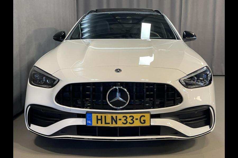 Mercedes-Benz C-Klasse Estate 300 e AMG Line C63 Diffuser/18"/Panoramadak/Laser LED/Trekhaak/Stoelverwarming + memory l + r/Adaptieve cruise/Sfeerverlichting premium/Elektrische klep/Apple Carplay & Android Auto