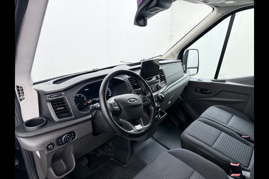 Ford Transit 310 2.0TDCI 130PK L2H2 3-Persoons Navi* Camera Apple Carplay Android Auto Cruise Control Lane Assist Pdc Trend Stoelverwarming Elek.Stoel Wifi DAB Betonplex Vloer Wandbetimmering Schuifdeur 1e Eigenaar Euro 6