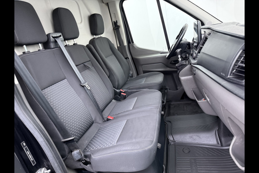 Ford Transit 310 2.0TDCI 130PK L2H2 3-Persoons Navi* Camera Apple Carplay Android Auto Cruise Control Lane Assist Pdc Trend Stoelverwarming Elek.Stoel Wifi DAB Betonplex Vloer Wandbetimmering Schuifdeur 1e Eigenaar Euro 6