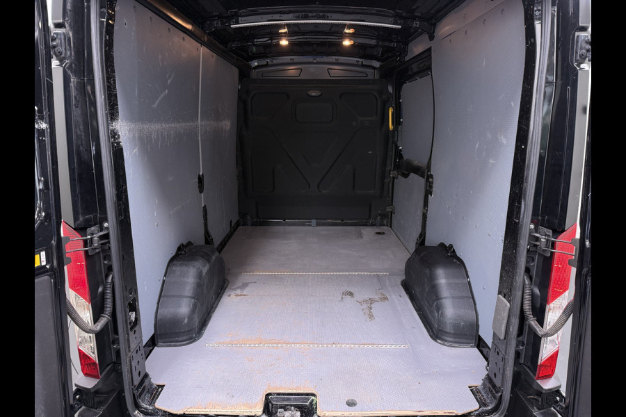 Ford Transit 310 2.0TDCI 130PK L2H2 3-Persoons Navi* Camera Apple Carplay Android Auto Cruise Control Lane Assist Pdc Trend Stoelverwarming Elek.Stoel Wifi DAB Betonplex Vloer Wandbetimmering Schuifdeur 1e Eigenaar Euro 6