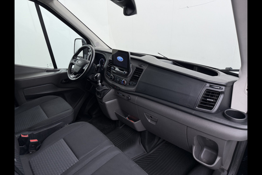Ford Transit 310 2.0TDCI 130PK L2H2 3-Persoons Navi* Camera Apple Carplay Android Auto Cruise Control Lane Assist Pdc Trend Stoelverwarming Elek.Stoel Wifi DAB Betonplex Vloer Wandbetimmering Schuifdeur 1e Eigenaar Euro 6