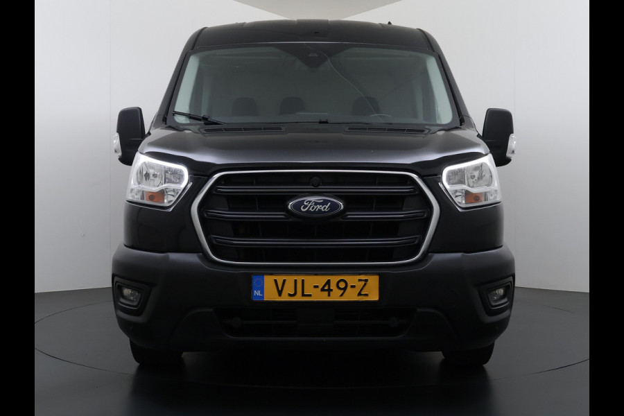 Ford Transit 310 2.0TDCI 130PK L2H2 3-Persoons Navi* Camera Apple Carplay Android Auto Cruise Control Lane Assist Pdc Trend Stoelverwarming Elek.Stoel Wifi DAB Betonplex Vloer Wandbetimmering Schuifdeur 1e Eigenaar Euro 6