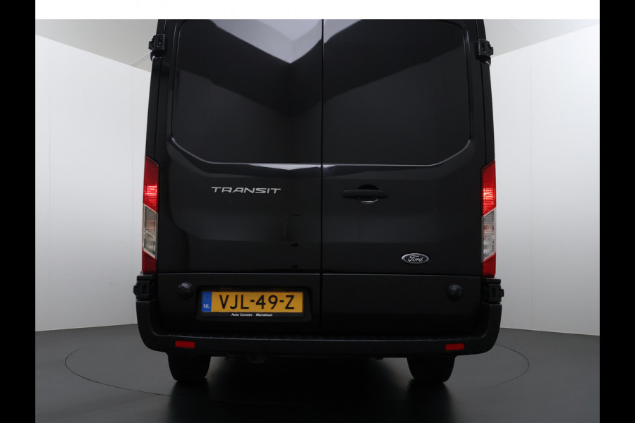 Ford Transit 310 2.0TDCI 130PK L2H2 3-Persoons Navi* Camera Apple Carplay Android Auto Cruise Control Lane Assist Pdc Trend Stoelverwarming Elek.Stoel Wifi DAB Betonplex Vloer Wandbetimmering Schuifdeur 1e Eigenaar Euro 6