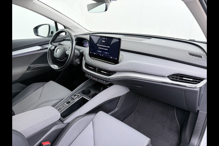 Škoda ENYAQ iV 60 SOH 93% Adap.Cruise Stuur+Stoelverwarming 3-Zone Ecc Camera Apple Carplay Android Auto Navi Pdc Lmv 20" DAB P-Assist Isofix Keyless-Go Verkeersbord detectie File Assist 1e Eigenaar Dealeronderhouden Origineel Nederlandse Auto