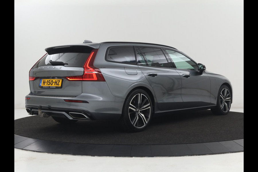 Volvo V60 2.0 T8 Twin Engine AWD R-Design | Trekhaak | Stoelverwarming | Carplay | Sportstoelen | Half leder | Navigatie | Camera | Side Assist | 19'' velgen | Full LED | Standkachel | Cruise control | PHEV | Plug In