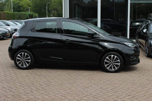 Renault ZOE R135 Intens 52 kWh / SoH 89,5% / Snelladen / Camera / CarPlay / Warmtepomp / Keyless / 16'' / Half leder / Dodehoek / Stuur+Stoelverwarming / DAB / Cruise Control