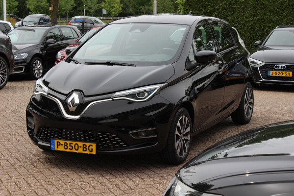 Renault ZOE R135 Intens 52 kWh / SoH 89,5% / Snelladen / Camera / CarPlay / Warmtepomp / Keyless / 16'' / Half leder / Dodehoek / Stuur+Stoelverwarming / DAB / Cruise Control