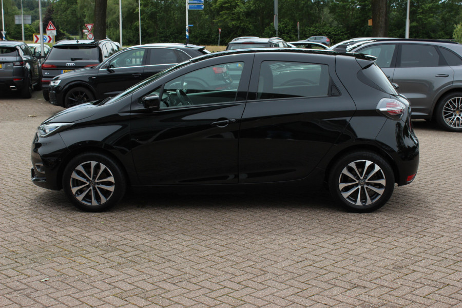 Renault ZOE R135 Intens 52 kWh / SoH 89,5% / Snelladen / Camera / CarPlay / Warmtepomp / Keyless / 16'' / Half leder / Dodehoek / Stuur+Stoelverwarming / DAB / Cruise Control