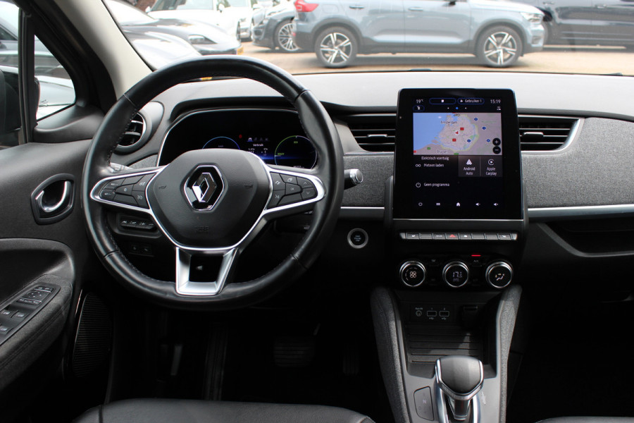 Renault ZOE R135 Intens 52 kWh / SoH 89,5% / Snelladen / Camera / CarPlay / Warmtepomp / Keyless / 16'' / Half leder / Dodehoek / Stuur+Stoelverwarming / DAB / Cruise Control