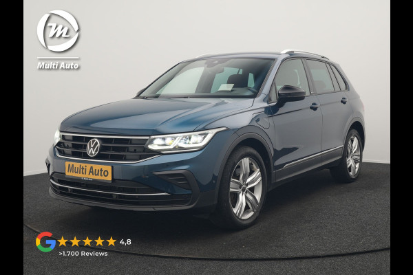 Volkswagen Tiguan 1.4 TSI eHybrid Active PHEV 245pk Dealer O.H. | Trekhaak Af Fabriek | Adaptive Cruise | Head Up | IQ Light | Keyless | Blis | Sportstoelen & Stuur Verwarmd | Sfeerverlichting | Apple Carplay | Navigate | DAB | 19"L.M | Plug In Hybrid |