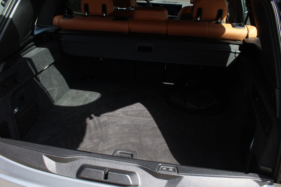 BMW X5 xDrive50e M-Sport Pro | Vierwielbesturing | H&K | Cognac Interior | Panoramadak | Trekhaak | Luchtvering