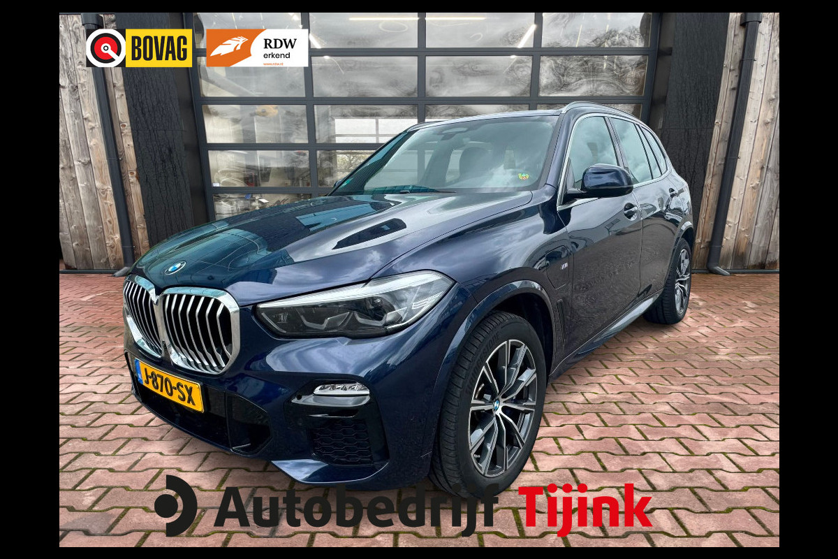BMW X5 xDrive45e High Executive M-Sport | Luchtvering |  Elek. trekhaak | Safety pack | Achterasbesturing | HUD | M aerodynamica | Leder |