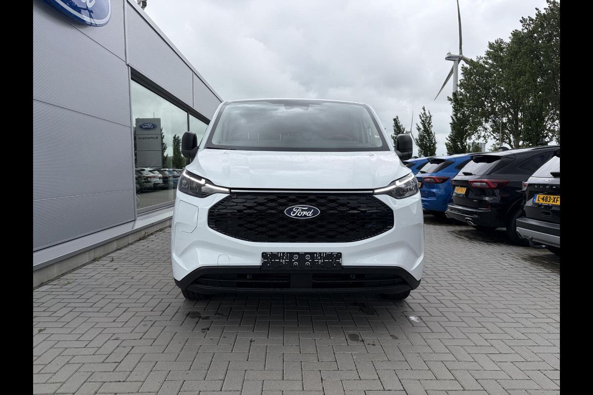 Ford E-Transit Cust. 340 L2H1 Trend 71 kWh 136pk | Bekleding zijwand en achterdeuren (volledig) | Laadvloer bescherming | 8-weg verstelbare en verwarmbare bestuurdersstoel met armsteun (i.c.m. bijrijdersbank) | Trekhaakvoorbereiding | Allweather banden | AGM accu | Laadkabel 10 | LED laadruimteverlichting (5 spots) | Vehicle Integration System