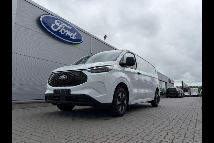Ford E-Transit Cust. 340 L2H1 Trend 71 kWh ZUID 136pk | Bekleding zijwand en achterdeuren (volledig) | Laadvloer bescherming | 8-weg verstelbare en verwarmbare bestuurdersstoel met armsteun (i.c.m. bijrijdersbank) | Trekhaakvoorbereiding | Allweather banden | AGM accu | Laadkabel 10 | LED laadruimteverlichting (5 spots) | Vehicle Integration System
