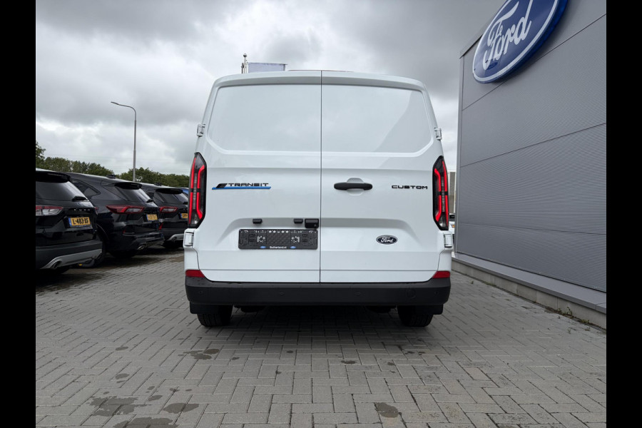 Ford E-Transit Cust. 340 L2H1 Trend 71 kWh ZUID 136pk | Bekleding zijwand en achterdeuren (volledig) | Laadvloer bescherming | 8-weg verstelbare en verwarmbare bestuurdersstoel met armsteun (i.c.m. bijrijdersbank) | Trekhaakvoorbereiding | Allweather banden | AGM accu | Laadkabel 10 | LED laadruimteverlichting (5 spots) | Vehicle Integration System
