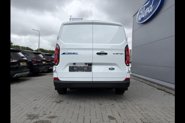 Ford E-Transit Cust. 340 L2H1 Trend 71 kWh ZUID 136pk | Bekleding zijwand en achterdeuren (volledig) | Laadvloer bescherming | 8-weg verstelbare en verwarmbare bestuurdersstoel met armsteun (i.c.m. bijrijdersbank) | Trekhaakvoorbereiding | Allweather banden | AGM accu | Laadkabel 10 | LED laadruimteverlichting (5 spots) | Vehicle Integration System