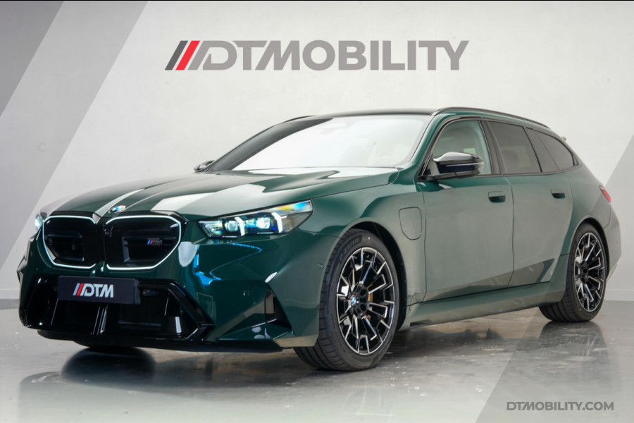 BMW 5 Serie Touring M5 | M-Drivers Pack | Keramisch | Akrapovič | Goodwood Grün Sonderlackierung